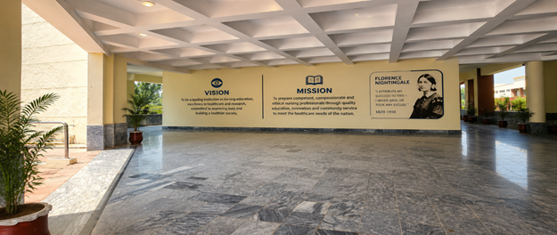 Spacious college hallway with Vision, Mission and Florence Nightingale mural